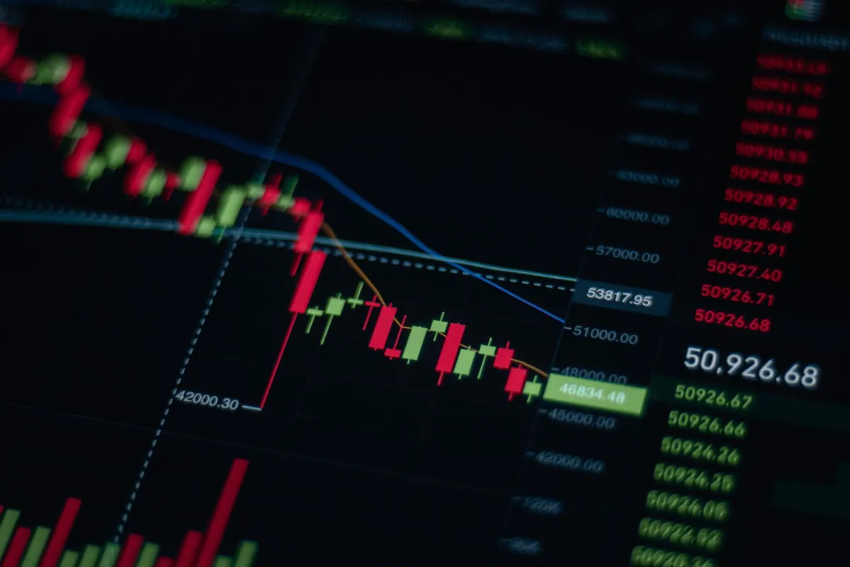Close-up of a data chart with trend lines on a monitor screen